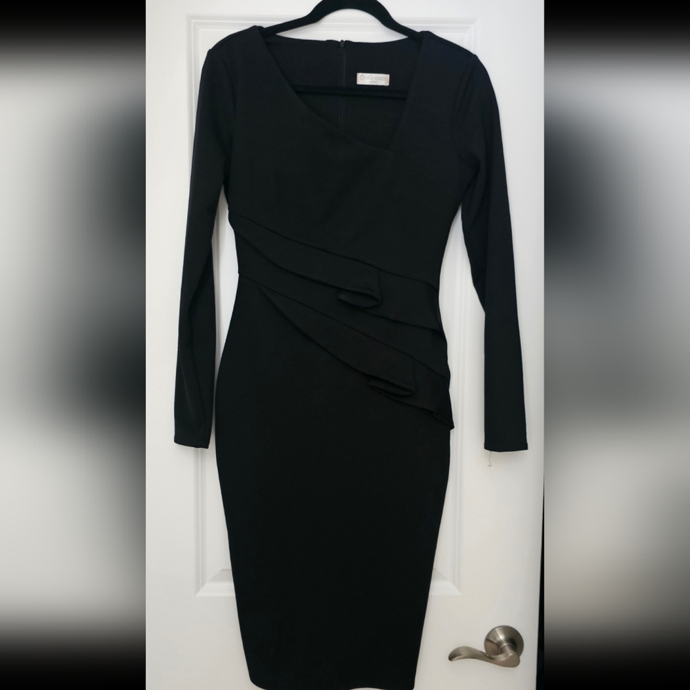 Elegant long sleeved black sheath dress